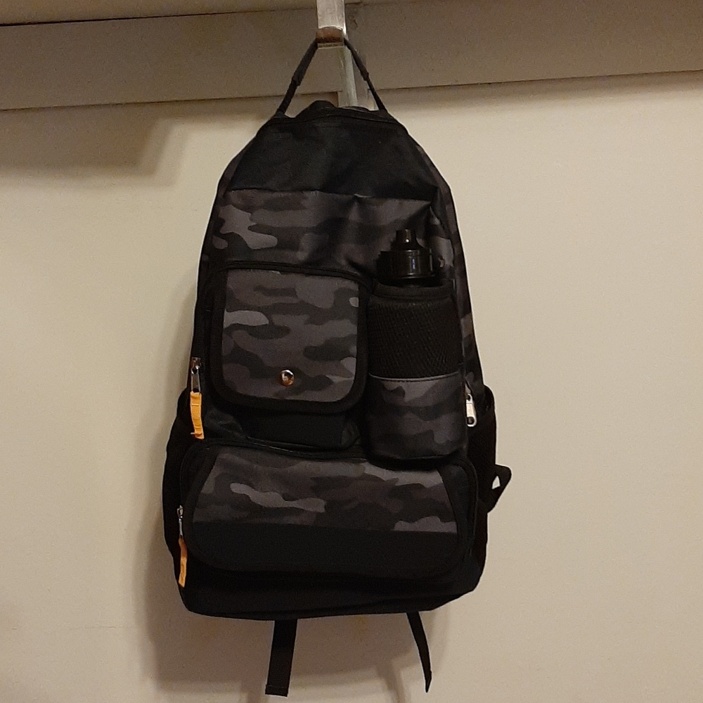 Brand new camo backpack with water bottle